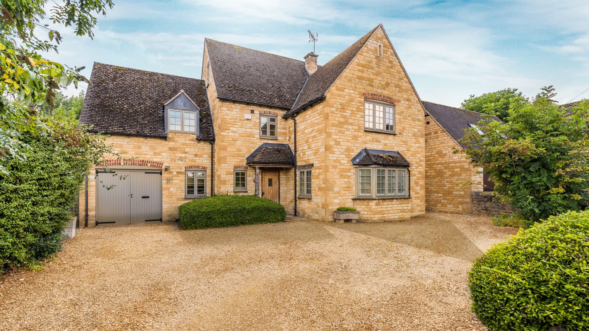 Rowan House is set down a peaceful close in Bourton-on-the-Water and has its own private driveway.