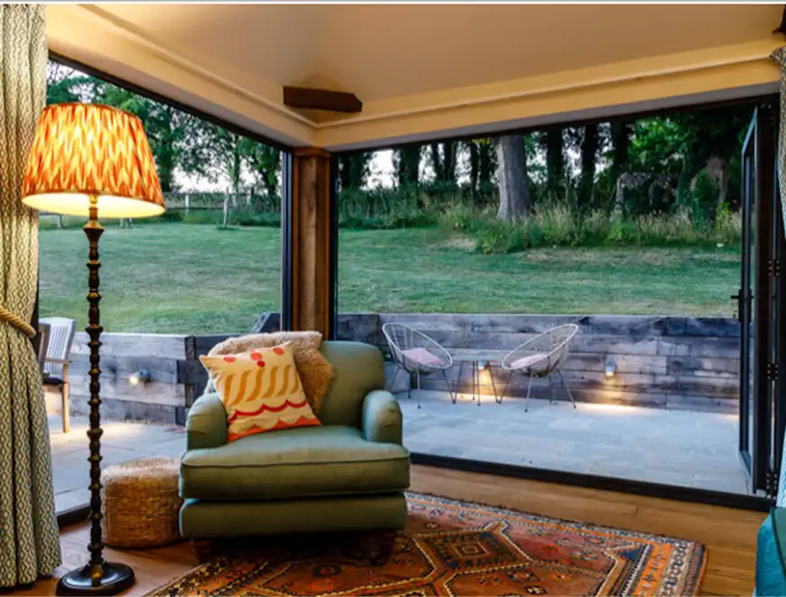 Connecting the inside to the outside spaces for barn conversion holiday cottage - by Astman Taylor