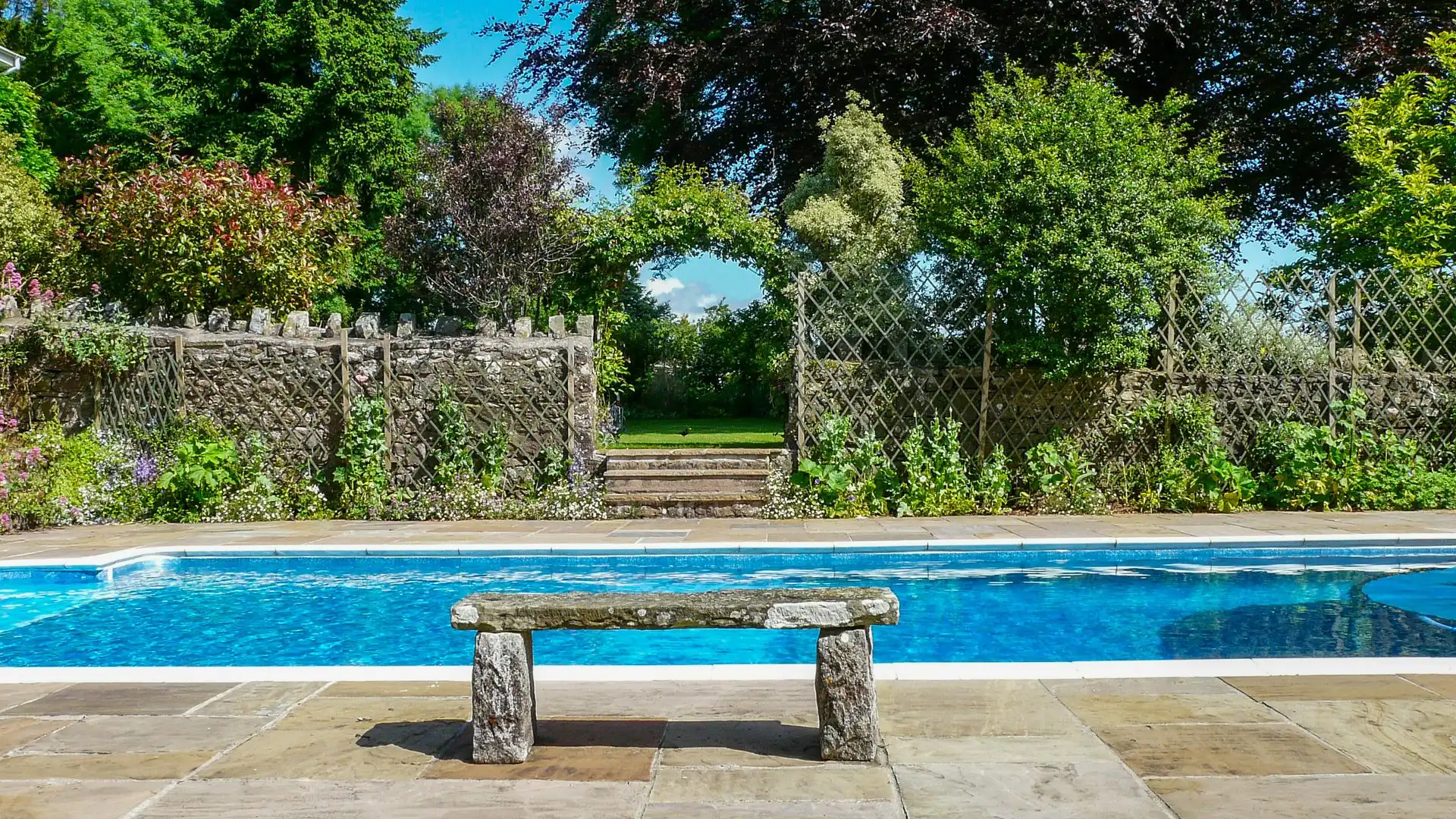 Take a dip in the pool or lounge by the side with a drink and a good book. 