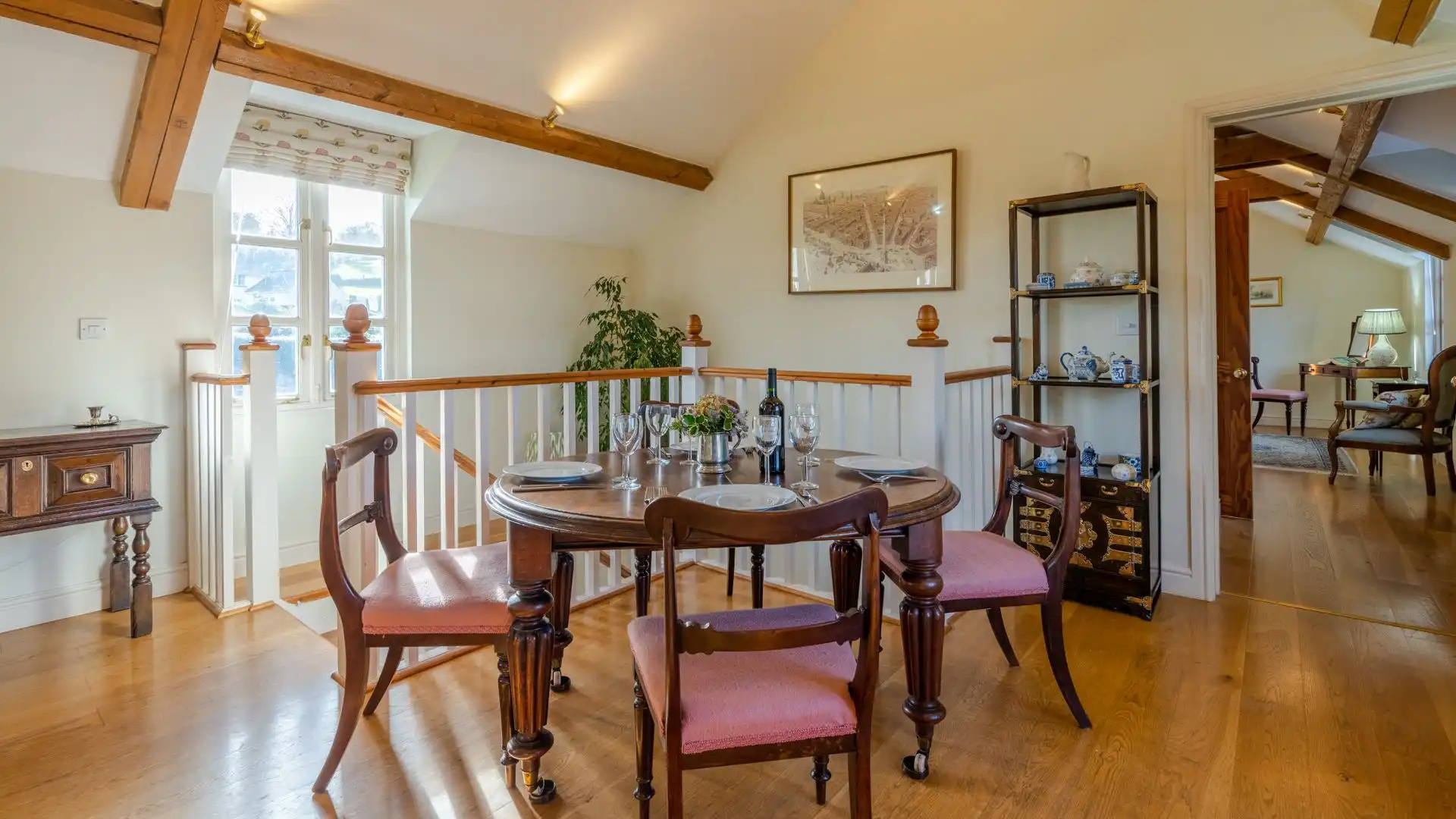Antique furniture adds character to this peaceful coach house.
