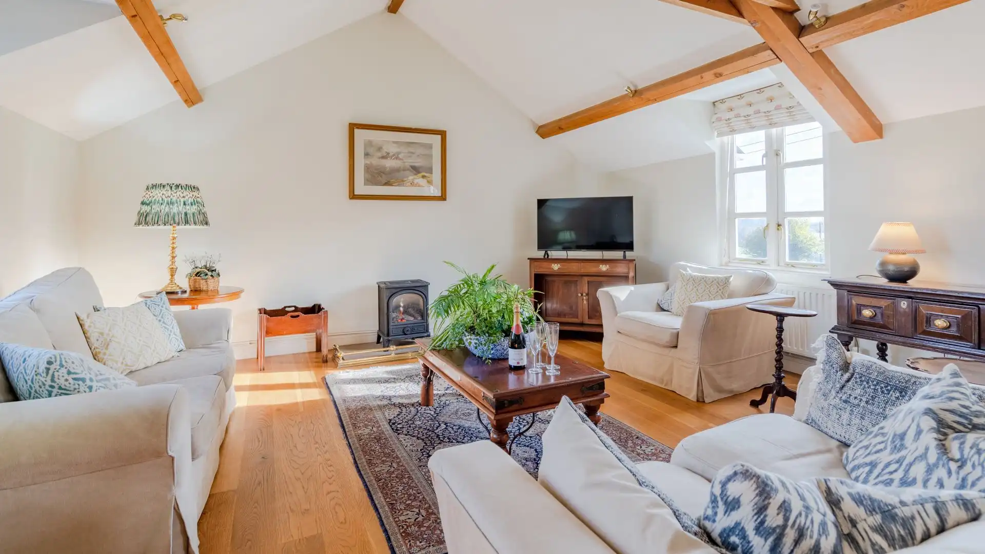 Sunlight floods the open-plan living area.