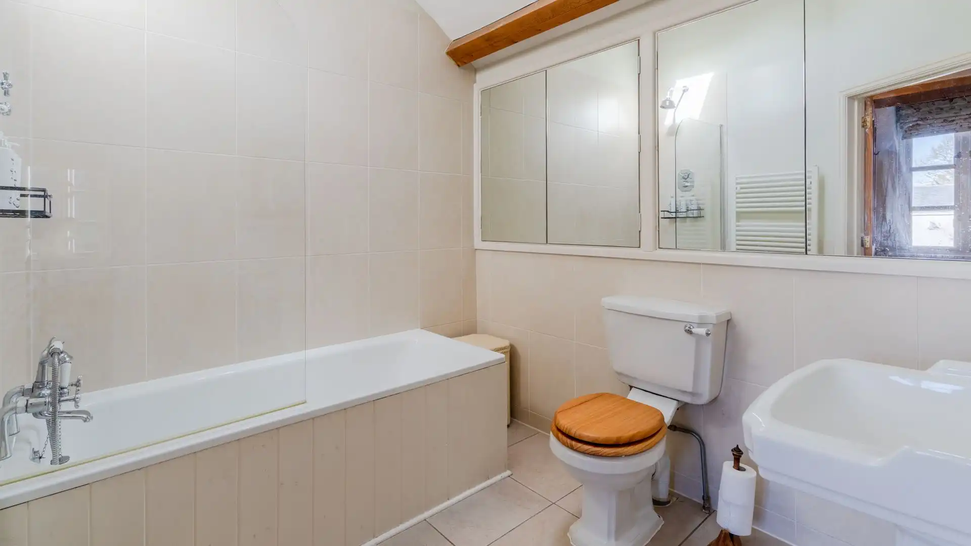 The en-suite has a bath and a shower.