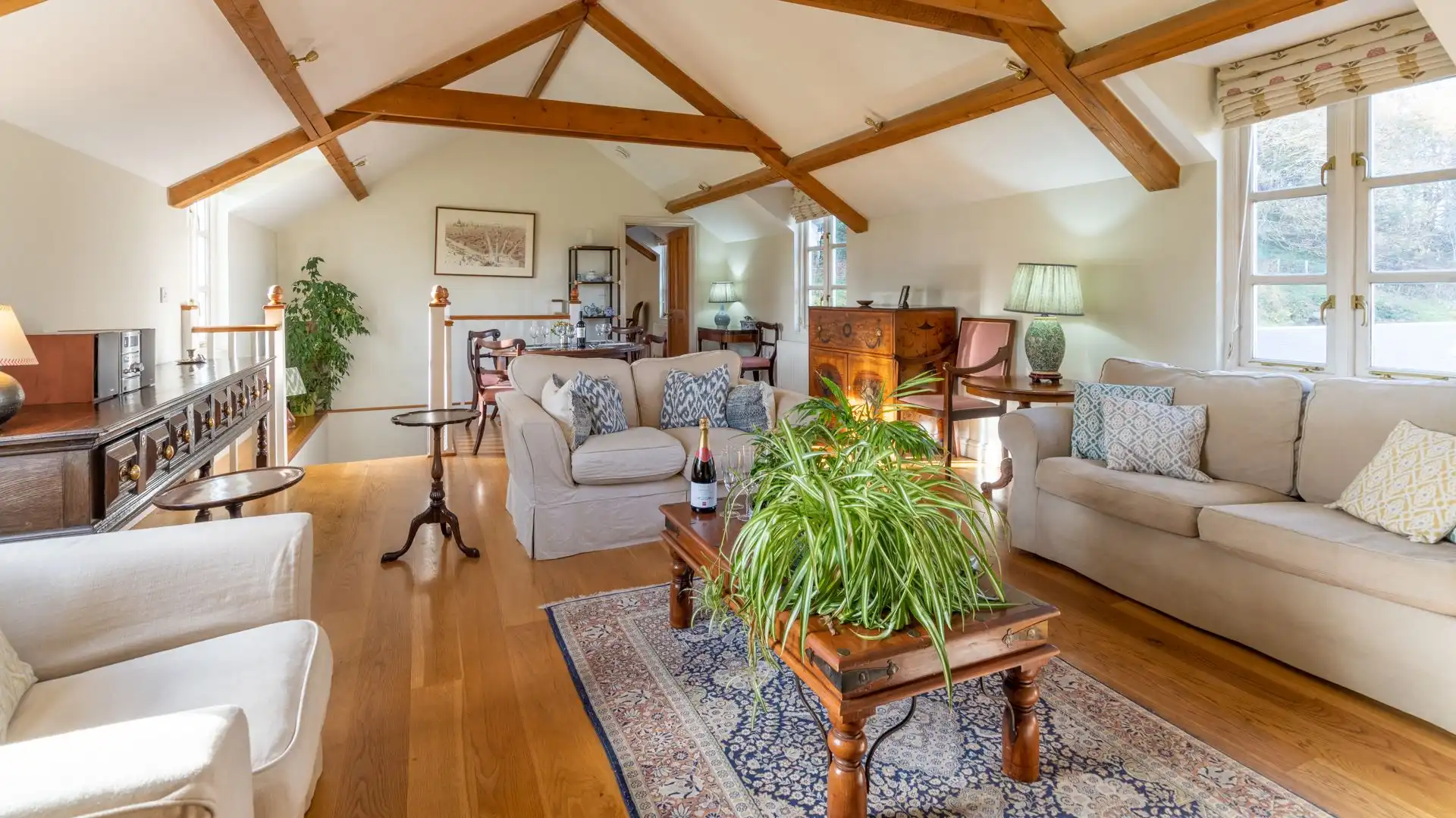 The living area has sweeping views across the grounds and the surrounding countryside.