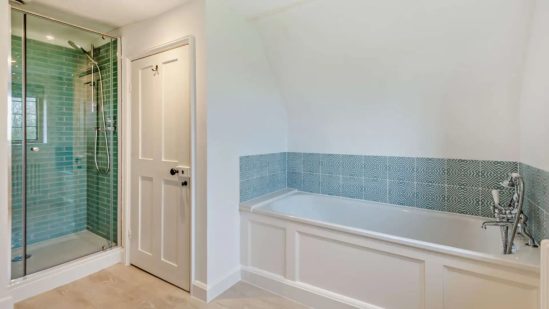 With both a bath with a hand-held shower and a separate shower you have everything you need 