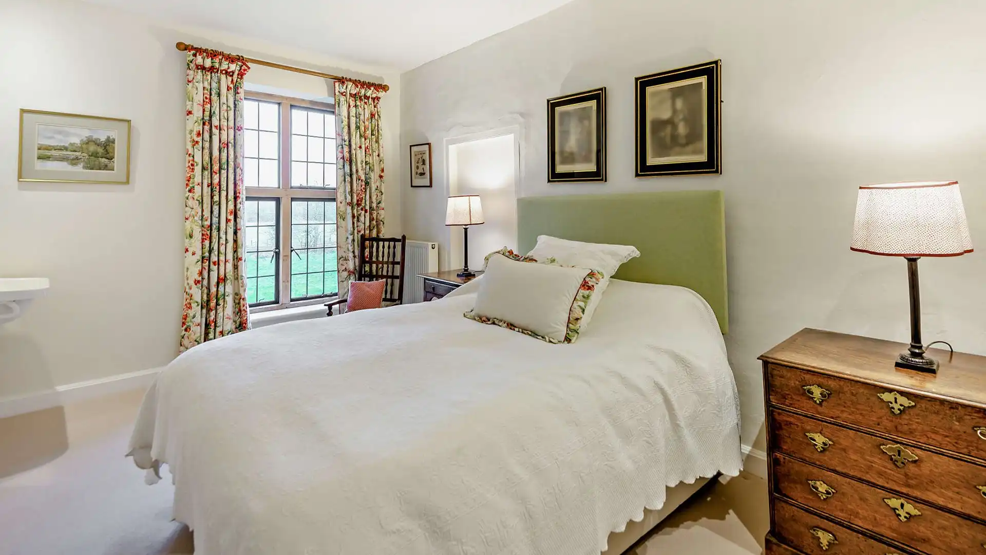 The final double bedroom, you can see the old beams in this charming room