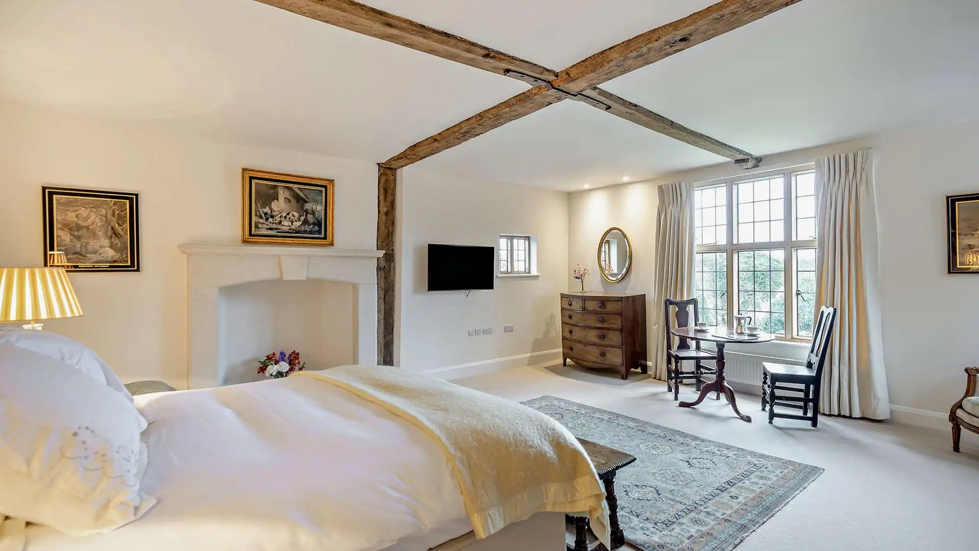 Start your days with views across the gardens and beyond from the grand master bedroom