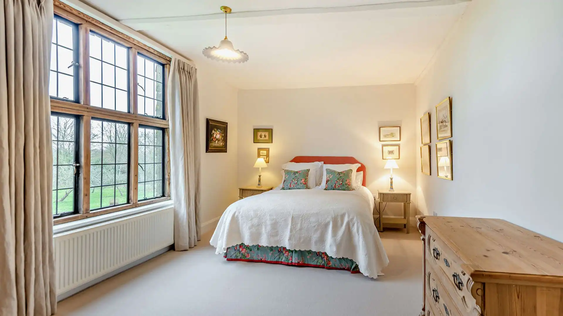 A king-size bed provides a restful night's sleep in bedroom two