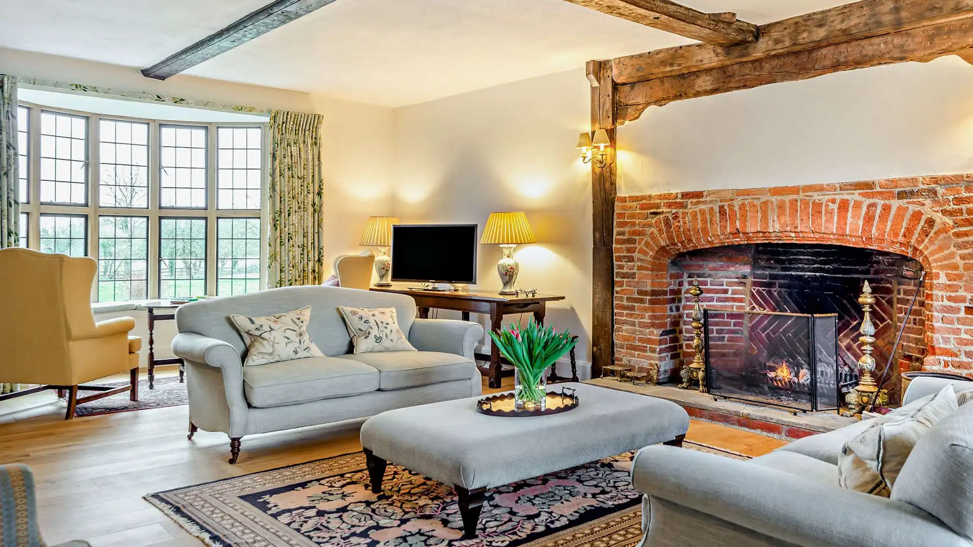 Gather in front of the impressive open fire and share conversation