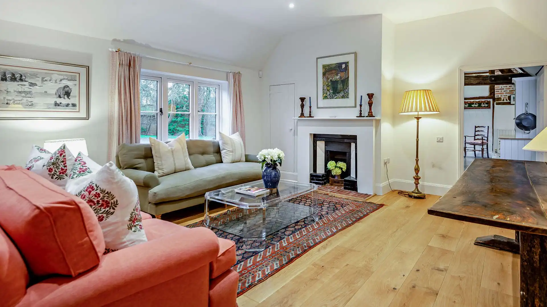 The living room lends itself to movie nights or curling up on a comfy sofa 