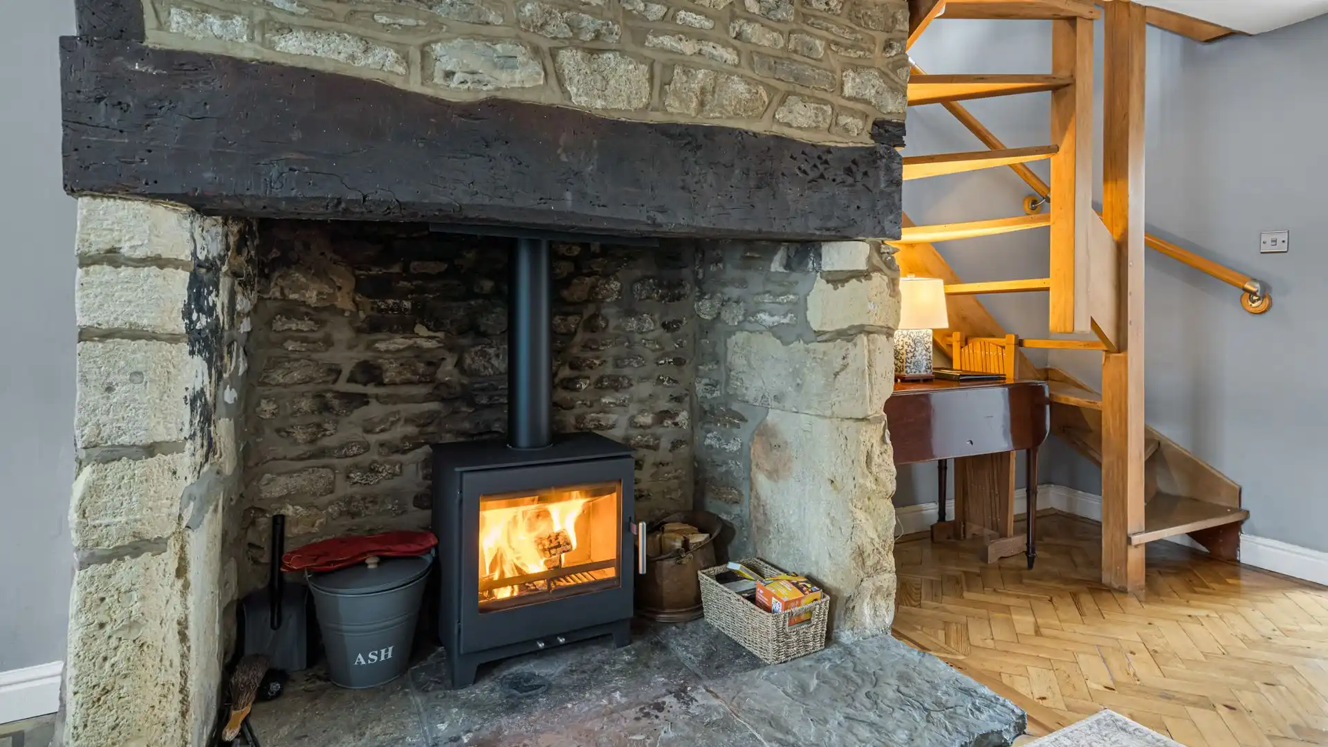 The wood-burner creates a welcoming atmosphere, Horsefair Cottage.