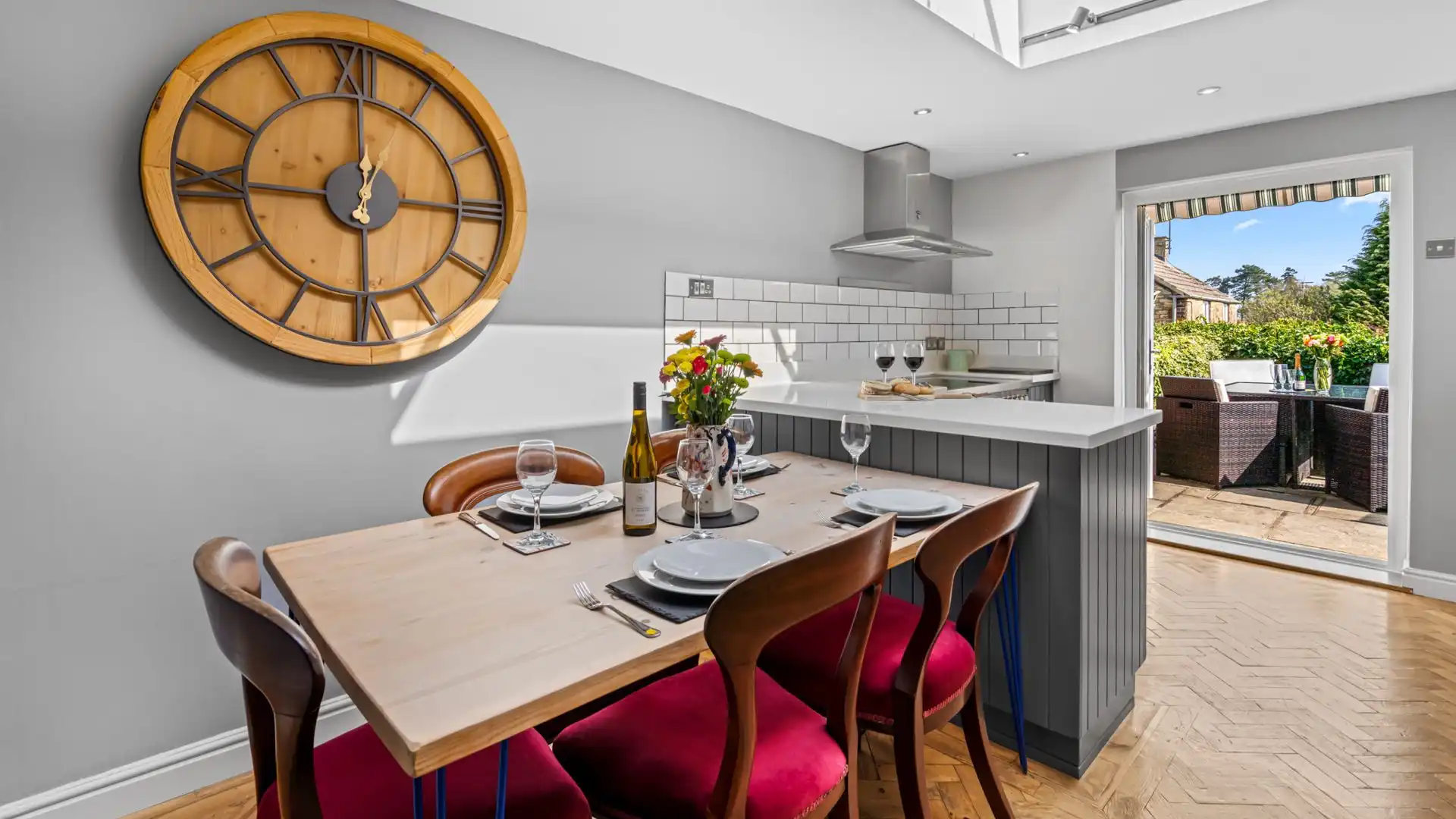 The open plan kitchen/diner features french doors to the garden, Horsefair Cottage.