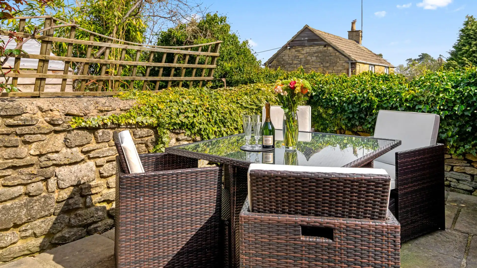 The courtyard is perfect for alfresco dining, Horsefair Cottage. 