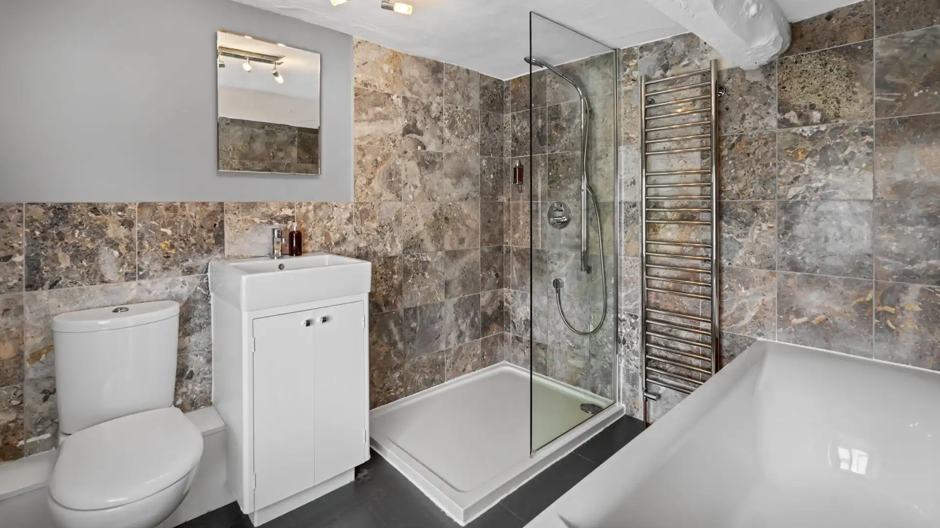 Enjoy long, relaxing soaks in the tub, Horsefair Cottage.