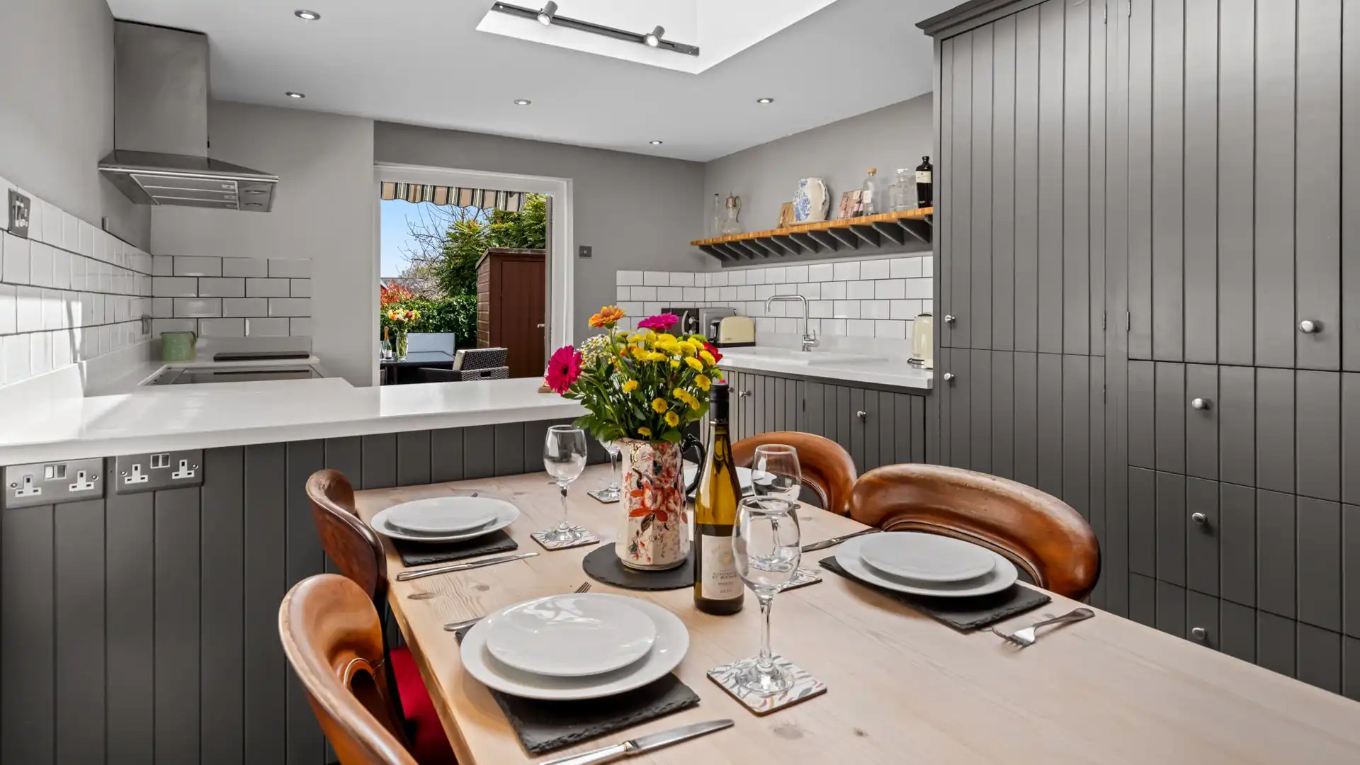 Enjoy chatter-filled dinners with loved ones, Horsefair Cottage.