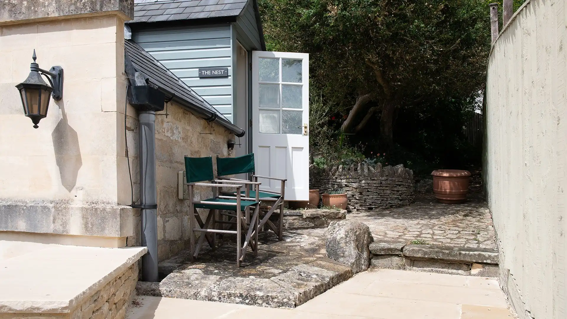 The Nest has a small outdoor area where you can set up the two director-style chairs. 