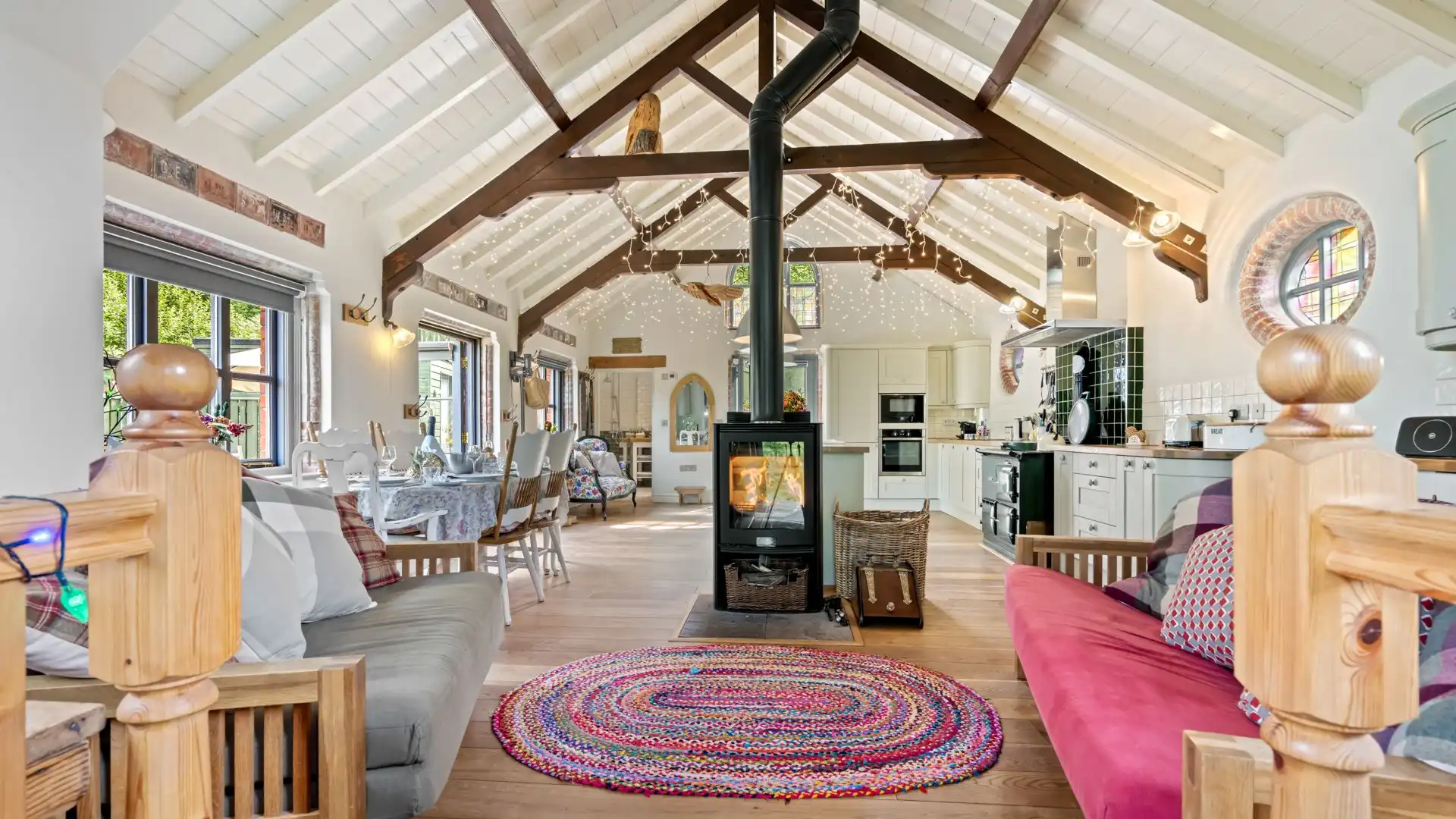 The main seating area flanks the woodburning stove making it a cosy spot. 
