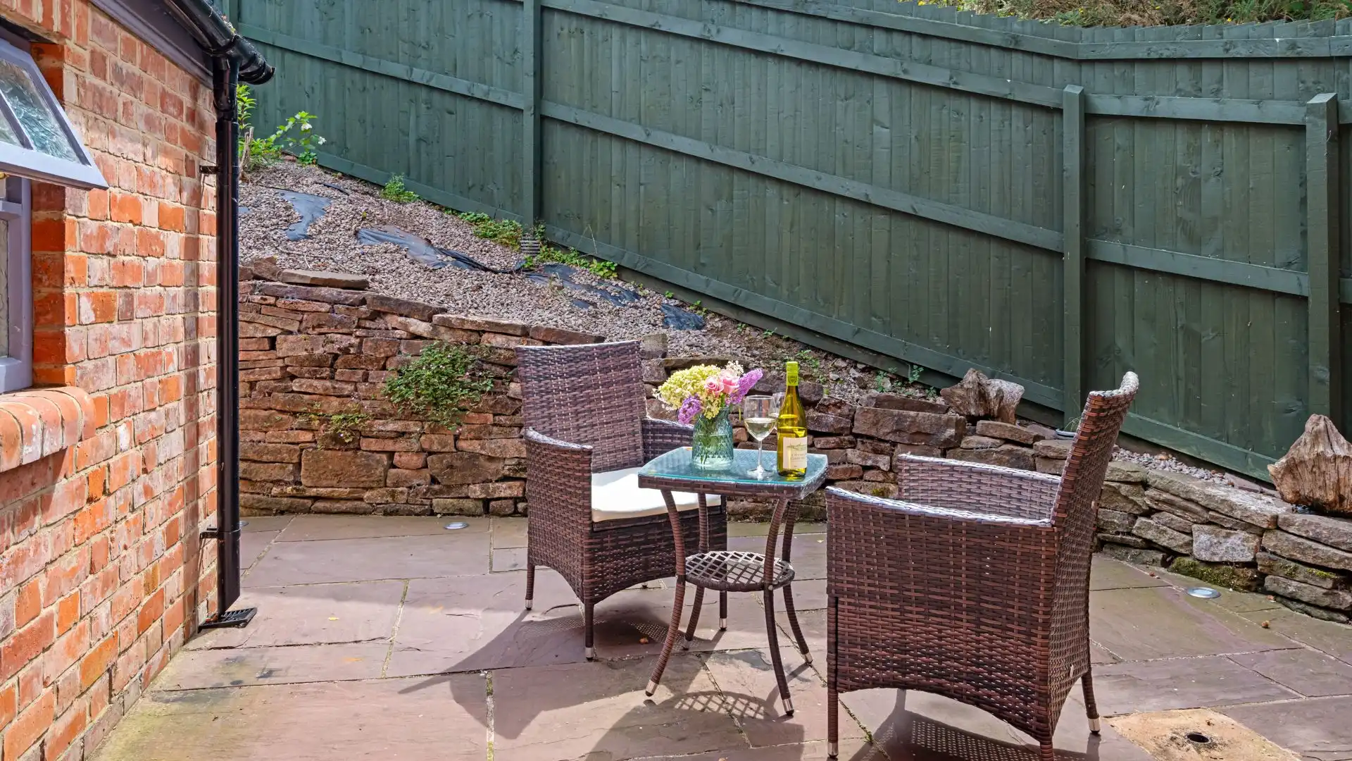 Behind the chapel is a lovely secluded area with a bistro set where you can start your day flicking through a magazine with a cup of coffee. 