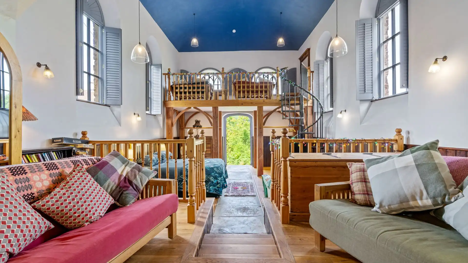 The settees here can be converted to beds for two guests and as this area is split level you have some privacy from those in the sleeping area beyond. 