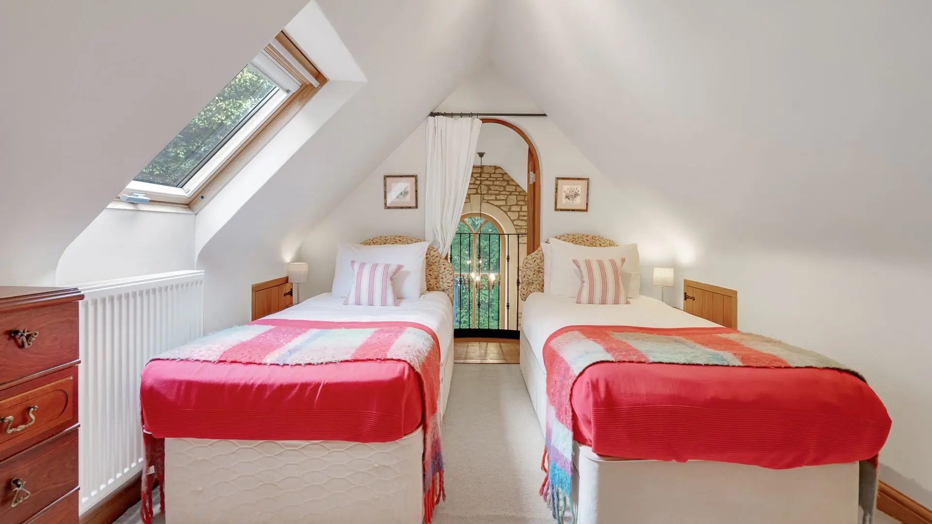 Bedroom three has two single beds.