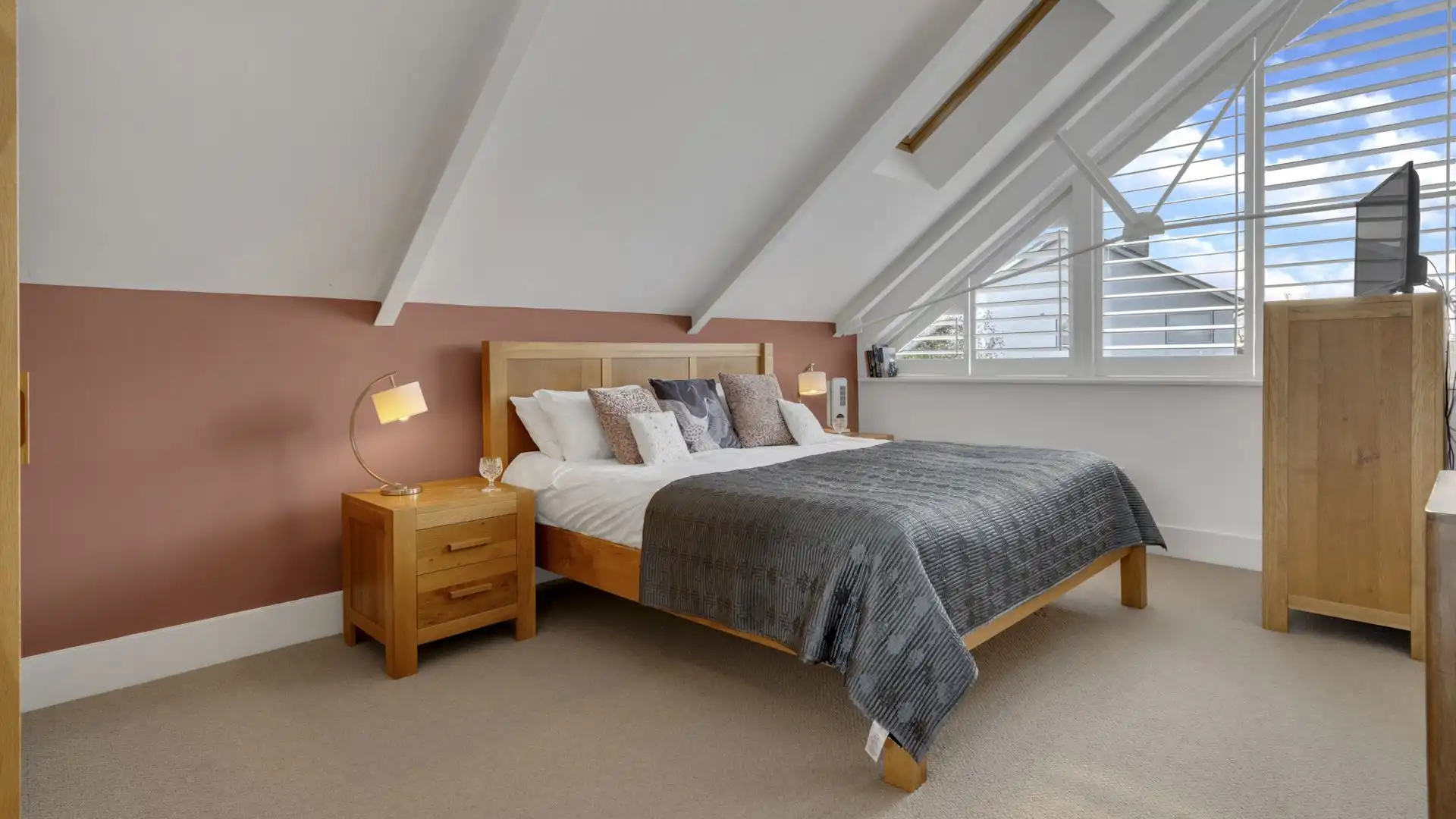 Up on the top floor is the master bedroom with a king-size bed.