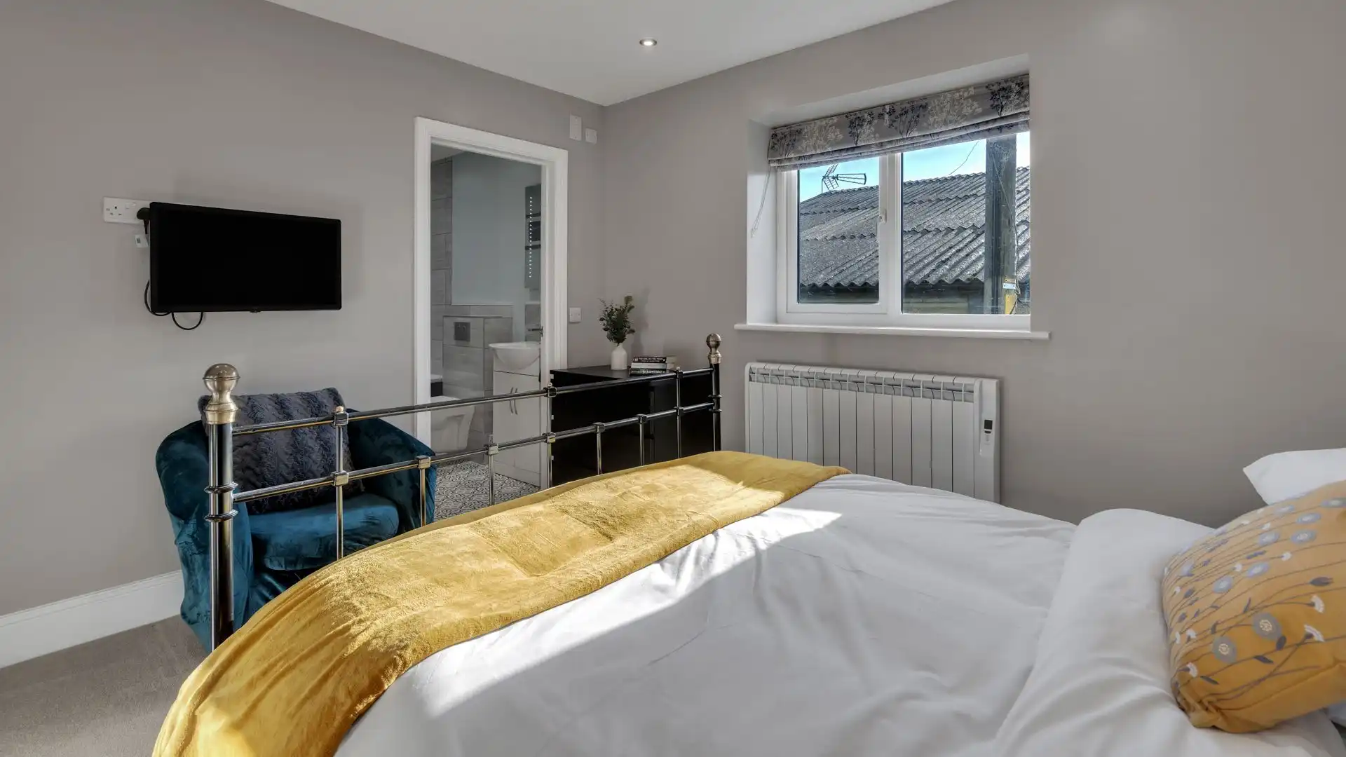 Bedroom One features a TV and Jack and Jill bathroom.