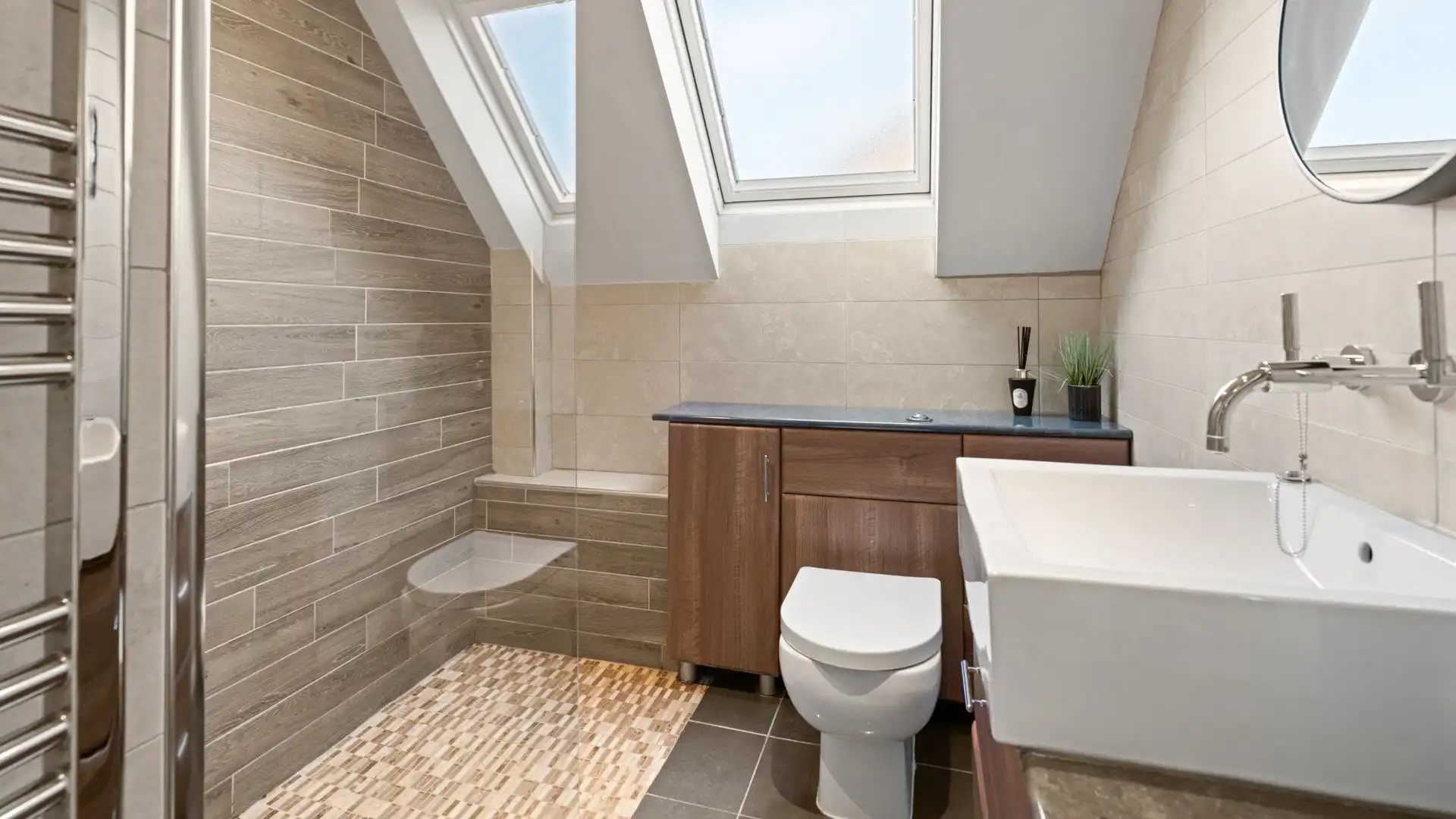 The shower room has a walk-in shower, WC and basin.