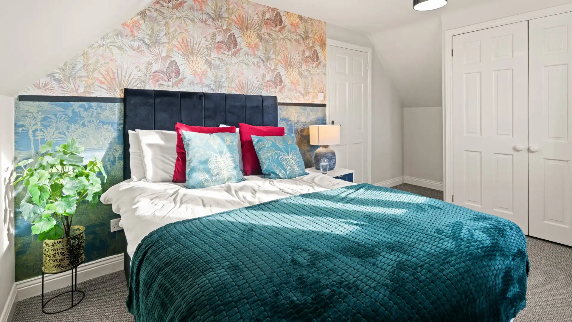 Bedroom two has a king-size bed and is set at the front of the house.