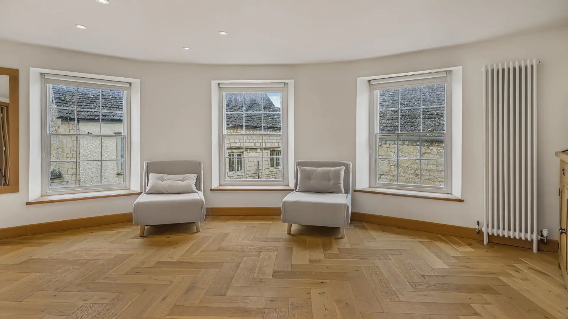 Two single sofa beds make this large bedroom ideal for parents with smaller children.