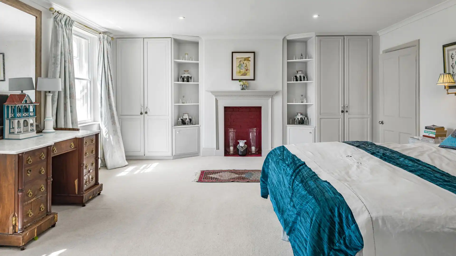 A spacious master suite with king-size bed.