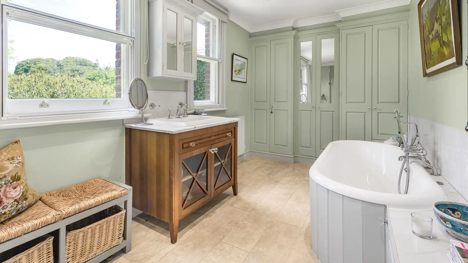 The master has a beautiful en-suite with walk-in shower and roll-top bath. 