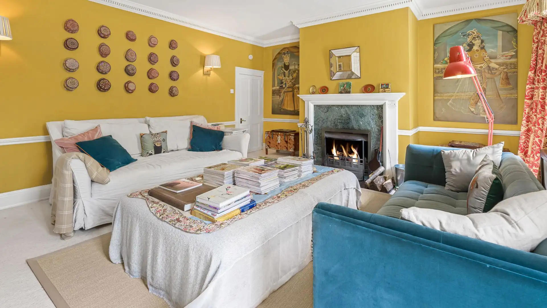 A cosy space to watch a movie or simply unwind by the log fire.
