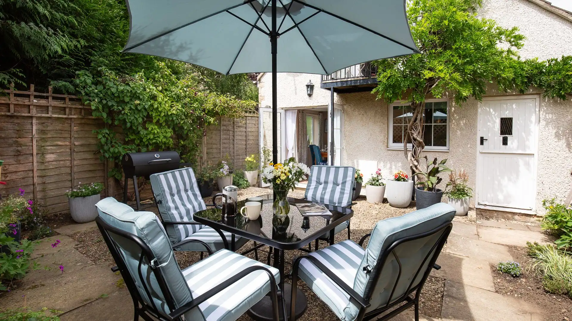 Relax in the serenity of the cottage garden. 