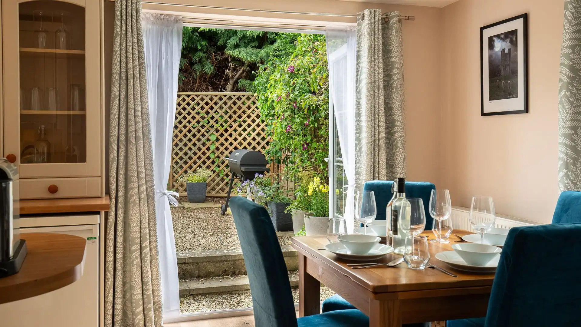 The stunning French doors leading out to your own private garden. 