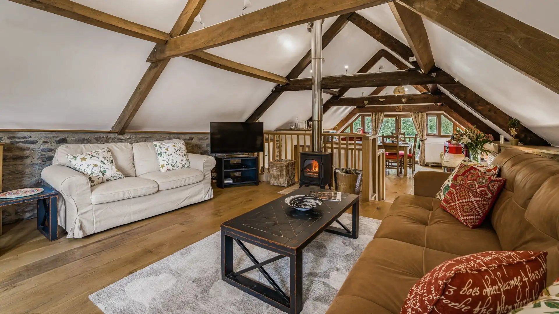 Settle down for the day by the roaring fire, East Barn.