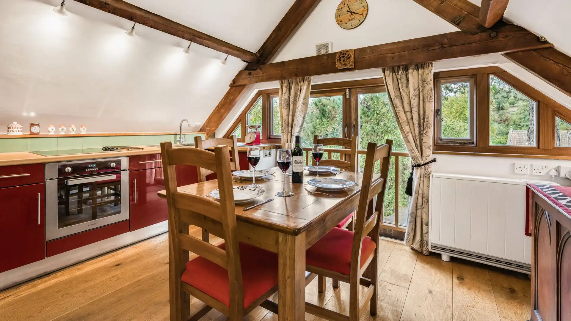 Gather round the dining table for a delicious meal, East Barn.
