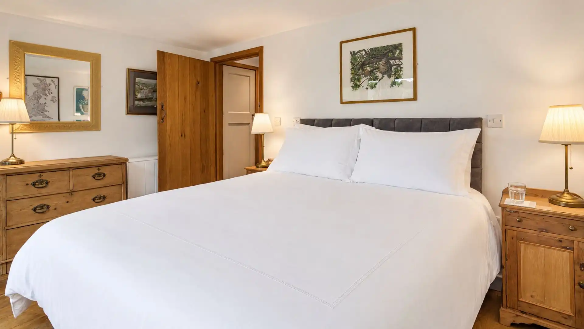 Styled tastefully, this bedroom exhibits a country-chic flair, East Barn.